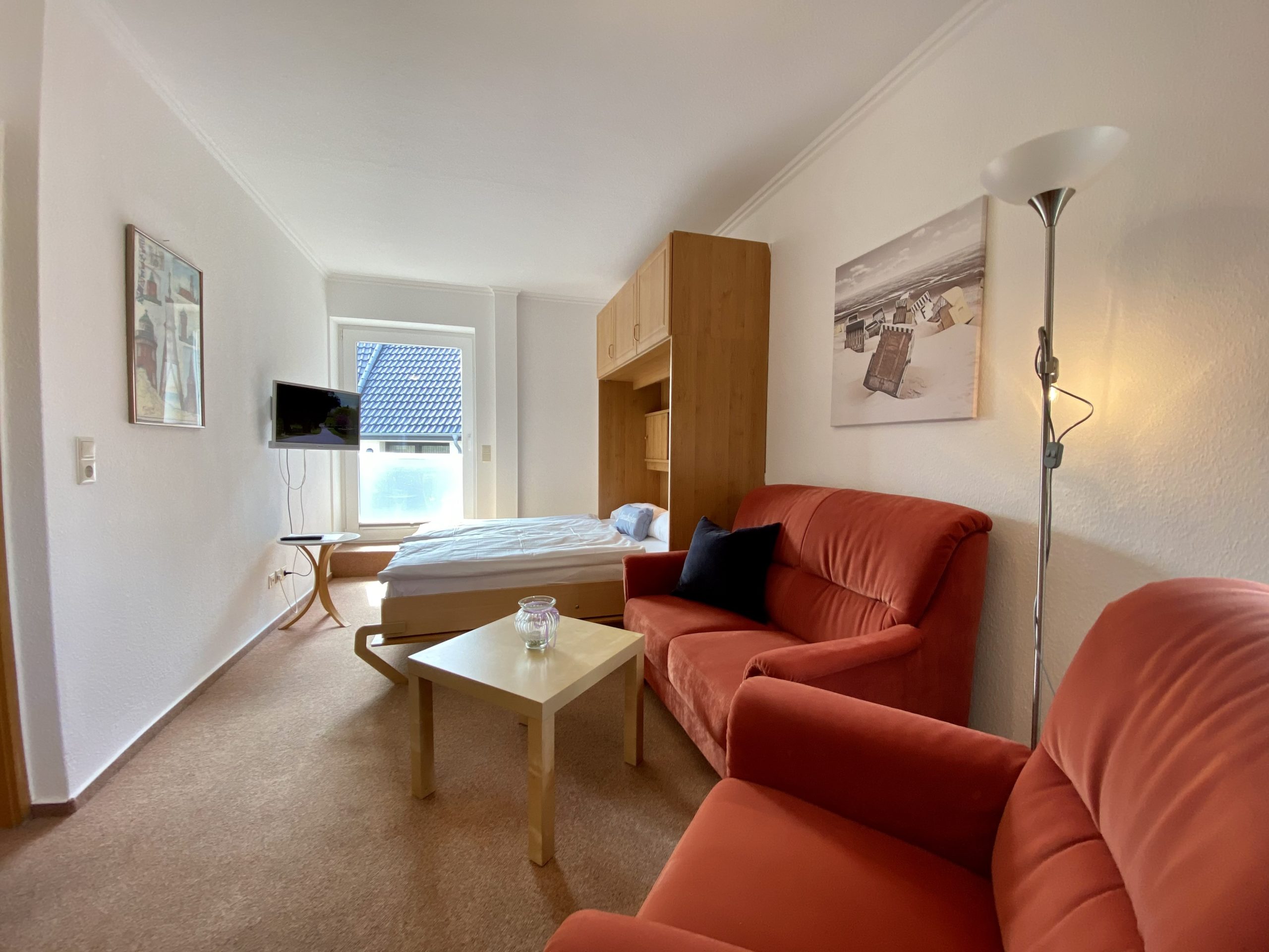 Wohnzimmer mit Bett